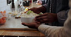 Hands, friends and cooking a salad in kitchen with recipe help, meal preparation or dinner party. Nutrition, people and fresh vegetables in home for vegetarian lunch, social gathering or healthy dish