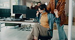 Chair, fun and business people in office with running, silly or goofy together in morning. Happy, career and creative editors playing game with team for comedy bonding on lunch break in workplace.