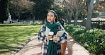 Coffee, university student and woman walk with tablet at  park for education, reflection or learning. Technology, college and girl at campus with drink, thinking and commute for scholarship outdoor