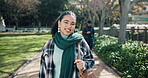 Student, face of woman and outdoor walk for education, learning and development at campus. Person, smile and portrait in park with commute for scholarship, knowledge and learning at university