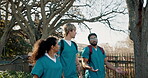 Medical, students and walking with people on campus for learning opportunity, doctor residency and college. Healthcare internship, future and medicine program with friends in university for pride