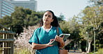Girl, medical student and tablet at campus, outdoor and click for class schedule on web in summer. Woman, tech and learning at healthcare college with app, thinking and check location at university