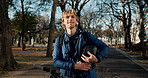 Helmet, happy and face of man with bicycle outdoor with confidence for university campus. Smile, bike and portrait of male student from Australia at college with pride for eco friendly transport.