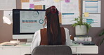 Back, computer screen and infographic with business woman in office for social media analytics. Charts, data and graphs on display with employee at desk in workplace to monitor engagement or traffic