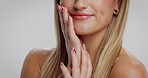 Woman, nails and skincare with manicure for beauty or cosmetics in studio on a white background. Closeup, female person or model with makeup, fingers or space for spa treatment, polish or salon