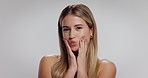 Face, pout and woman in studio, skincare and dermatology with beauty on white background. Space, grooming and person with confidence, wellness or cosmetics with shine, flirt or glow with healthy skin