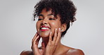 Face, laughing and skincare with happy woman in studio for cosmetics or dermatology results. Aesthetic, beauty and satisfaction with African model touching skin on white background for cosmetology