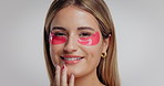 Eye mask, skincare and face of woman in studio for natural, beauty and facial glow with cosmetics. Happy, health and portrait of person from London with dermatology products by white background.
