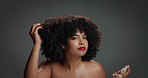 Girl, face and hairspray with afro in studio, keratin or test product for beauty on background. Woman, bottle and self care with benefits, space and collagen for texture with cosmetics in Costa Rica