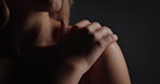 Hand, shoulder and skincare with model in dark studio for beauty, cosmetics or dermatology routine. Aesthetic, soft and touching with woman on black background for cosmetology, hydration or wellness