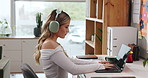 Woman, student and typing with laptop in home with elearning, assessment and headphones for music. Girl, computer and streaming with education, online course and college assignment at apartment
