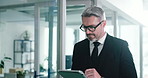 Walking, businessman and browse on tablet, office or research for investment opportunity on website. Online, investor and person with tech for financial report, scroll and review stock market updates