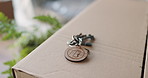 Box, keys or relocation with outdoor of new house for property investment or residential closeup. Real estate, rent or mortgage home with cardboard package for apartment, housing or accommodation