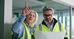 Business people, architect or team with documents for construction plan or building maintenance. Mature man, woman or contractors with blueprint or floor layout for industrial inspection in workplace