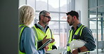 Business, construction site and people with teamwork, conversation and planning in meeting. Discussion, men and woman with feedback, architecture or documents with cooperation, talking or engineering