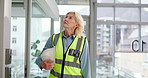 Engineer, woman or walking with building inspection for quality assurance, check design or progress. Contractor, mature person or project management on site for office renovation or remodeling safety