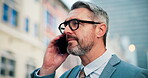 Business, man and chat with phone call in city for discussion, travel and finance consultant. Mature person, mobile and conversation with contact feedback, financial negotiation and advice of commute