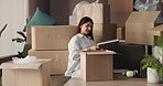 Happy, woman and boxes with books in home or new house for packing with furniture. Female person, ownership and relocation with unboxing for moving in, property and real estate for rent or mortgage