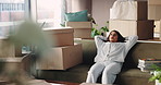 Boxes, relax and woman on sofa, new home and tired with mortgage, property investment and real estate. Apartment rental, cardboard and person on couch, fatigue and exhausted with break and burnout