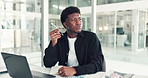 Black man, writing notes and thinking at office with finance, trading and decision for investment opportunity. African person, book and perspective with plan, review or charts with budget at agency