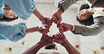 Circle, fist bump and group of business people in office with solidarity, unity or collaboration. Support, partnership and team of corporate employees with hands together for celebration from below.