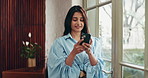 Phone, window and woman in office with contact, communication or chatting on mobile app. Technology, thinking and person with cellphone for texting, networking or social media on break in workplace.