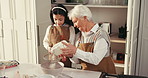 Baking, learning and child with grandmother in kitchen for bonding, fun or development together. Happy, flour and girl kid helping senior woman with preparing dessert, cake or cookies in home.