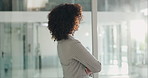 Crossed arms, thinking and businesswoman in office by window for finance ideas, decision or choice. Pride, confident and female financial manager with memory for career development  in workplace.