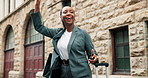 Black woman, business and wave with suitcase in city for lift, taxi or cab ride on sidewalk. Female person, hailing or employee waiting with smile for private transportation service in an urban town