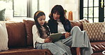 Mom, girl and tablet on sofa with talk, scroll and choice for movie with streaming service at home. People, mother and daughter in lounge with tech, app or relax with subscription at family house