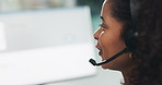 Woman, headset and talk at call center for legal aid, consulting and advisory services at office. Person, agent and discussion with voip mic with smile, solution and computer with contact at law firm