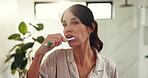 Face, dental health and woman brushing teeth in bathroom for wellness, hygiene or morning routine. Oral care, toothbrush and portrait of female person with treatment for fresh breath in home.