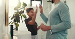 Happy, child and high five with father in bathroom for brushing teeth, celebrate and hygiene support. Smile, family and thumbs up for dental health, cleaning teeth and self care for wellness at home