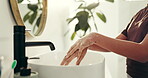 Hands, cleaning and water in home with soap for hygiene. Tap, health care and person in wellness with disinfectant, germ removal and dermatology in bathroom with cosmetic for skincare treatment.