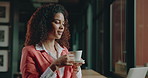 Business woman, coffee and cafe with laptop for morning drink, beverage or journalism. Female person, freelancer or journalist with caffeine, cup or mug on computer for remote work in restaurant
