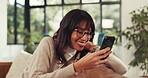 Smile, woman and reading with phone at house on social media, review ebook and comedy video. Happy, female person and laugh with mobile for surfing internet, streaming subscription and funny message