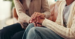 Women, holding hands and empathy in home for trust, compassion and friends with grief and helping. House, care and patience for person in living room, consoling or understanding of trauma or kindness