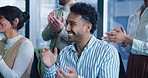 Man, success and applause at meeting with team, goals and congratulations with praise at office. Business people, smile and support for deal, celebration or excited for announcement in boardroom