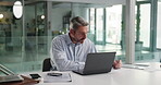 Reading, writing and laptop with business man in office for research, risk assessment and planning. Insurance claims, policy payout and thinking with mature person in agency for premium update