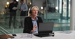 Business woman, consultant or laptop with headset for finance advice or customer service in office. Female person, agent or financial advisor talking with computer or documents for virtual assistance