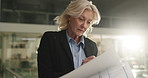 Thinking, reports and businesswoman in office at night with finance documents for company budget plan. Writing, ideas and mature female financial manager with investment proposal with deadline.