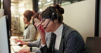 Team, woman and headache at computer in call center for bad sales service, night or telecom glitch. Coworking, agent and stress with headset for telemarketing issue, outbound crisis and global client