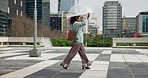 Dance, umbrella and business woman in city for morning commute, travel and excited for work. Celebrate, weather protection and person with energy for success, good news and career promotion in town