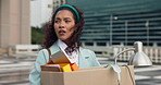 Business woman, jobless and city with box for unemployment, termination or economic recession. Sad, female person and walking with desk equipment for company dismissal or downsize in an urban town