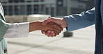 Handshake, deal and business women in city for partnership, agreement or greeting for meeting. Collaboration, welcome and financial manager shaking hands with client for investment offer in town.