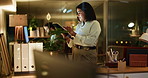 Business woman, night or office with tablet in office for administration or project deadline. Female person, admin or secretary working late with technology for company report or tasks in workplace