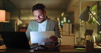 Night, documents and business man on computer for online proposal, revenue and expense report. Dark, corporate and person typing with paperwork for financial review, budget planning and deadline