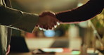 Night, handshake or people in office, partnership, or thank you with agreement for investment contract. Closeup, evening and workers with company merger, welcome and shaking hands with financial deal