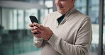 Hands, phone and text message with business man in office for communication or connection. App, mobile and typing with professional employee in workplace for online chat, planning or research