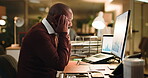 Computer, headache and night with business black man at desk in office for trading frustration or stress. Data, evening and stock market with mature employee at work for financial debt or loss